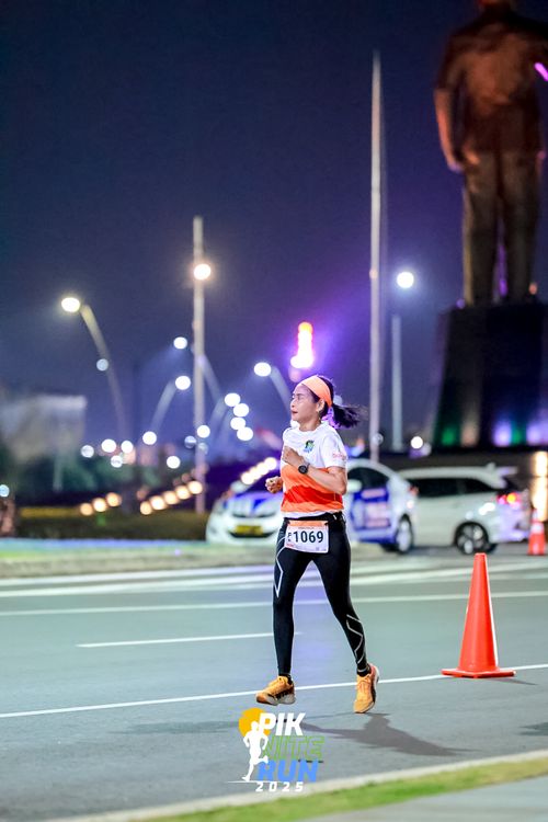Race photo from PIK NITE RUN 2025