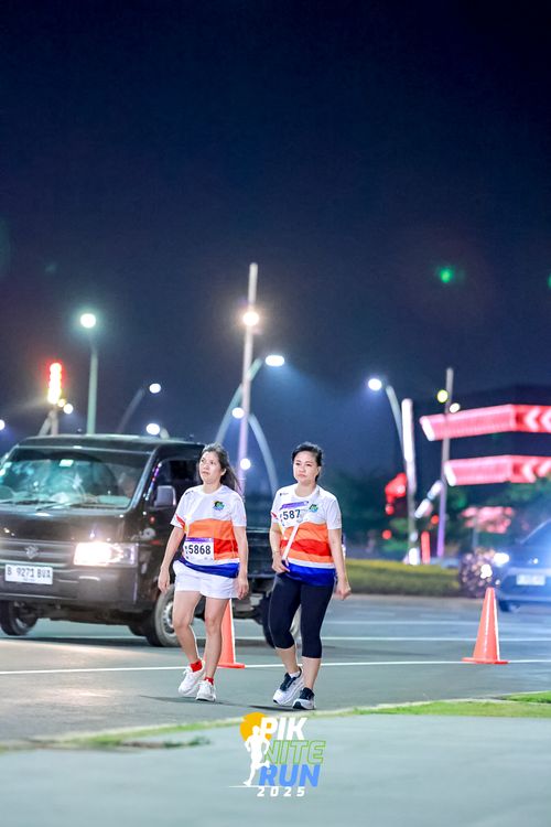 Race photo from PIK NITE RUN 2025