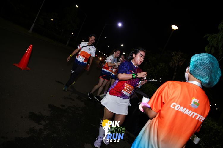 Race photo from PIK NITE RUN 2025