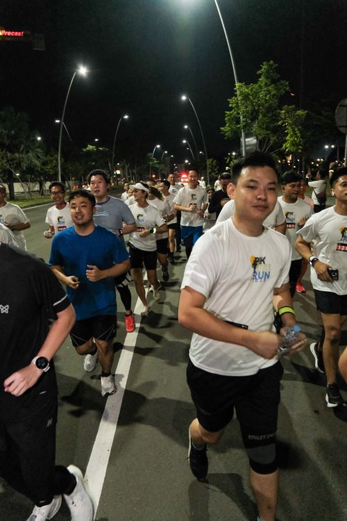 Race photo from PIK NITE RUN VIBES