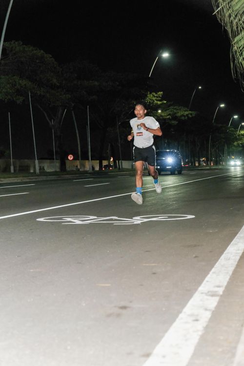 Race photo from PIK NITE RUN VIBES
