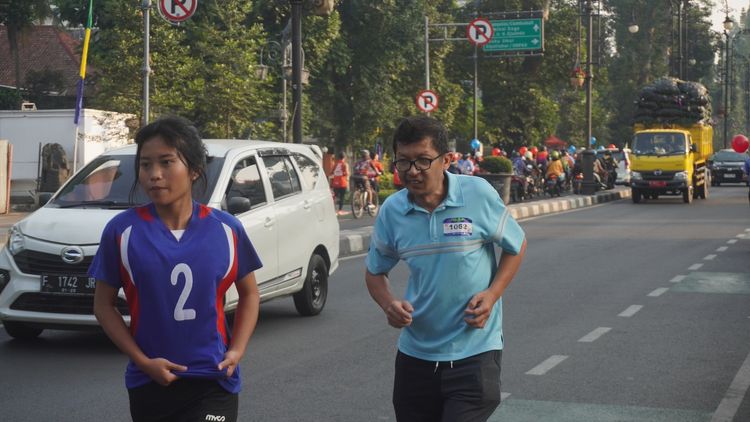 Race photo from Happy One Decade Unpad Runner