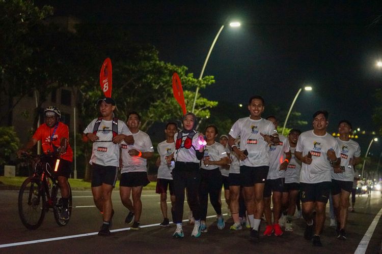 Race photo from PIK NITE RUN VIBES