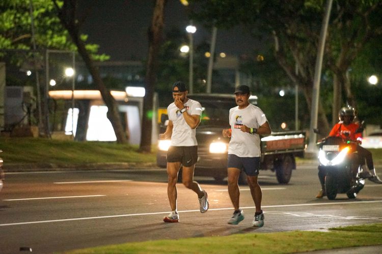 Race photo from PIK NITE RUN VIBES
