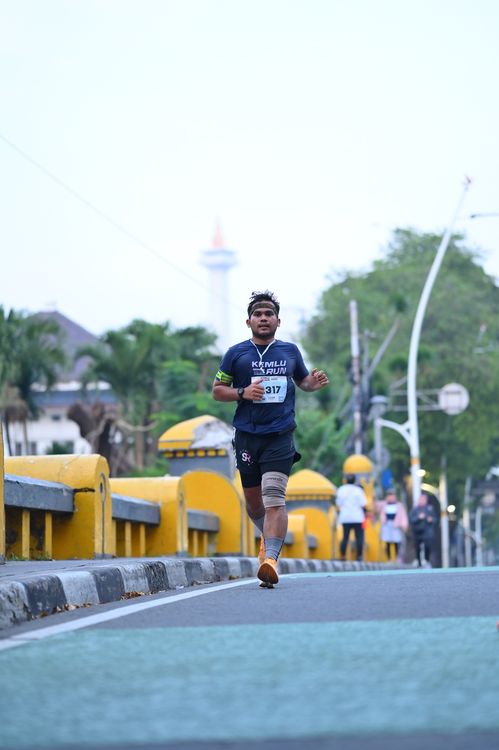 Race photo from KEMLU RUN 2025