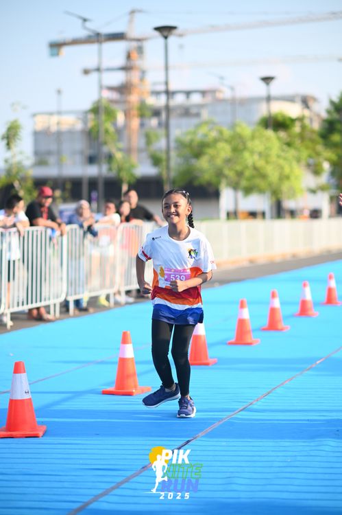 Race photo from PIK NITE RUN 2025