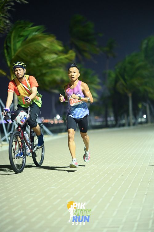 Race photo from PIK NITE RUN 2025
