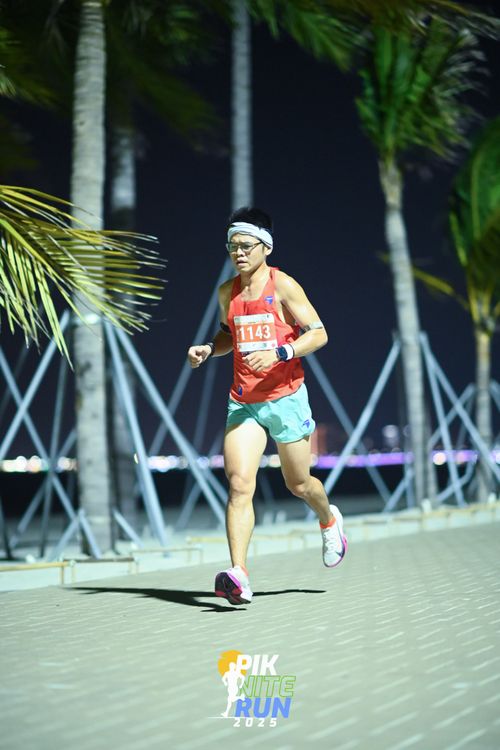 Race photo from PIK NITE RUN 2025
