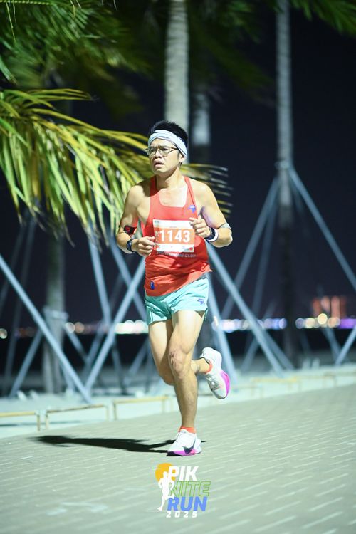 Race photo from PIK NITE RUN 2025