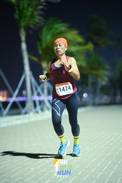 Race photo from PIK NITE RUN 2025