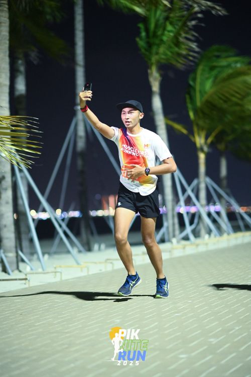 Race photo from PIK NITE RUN 2025