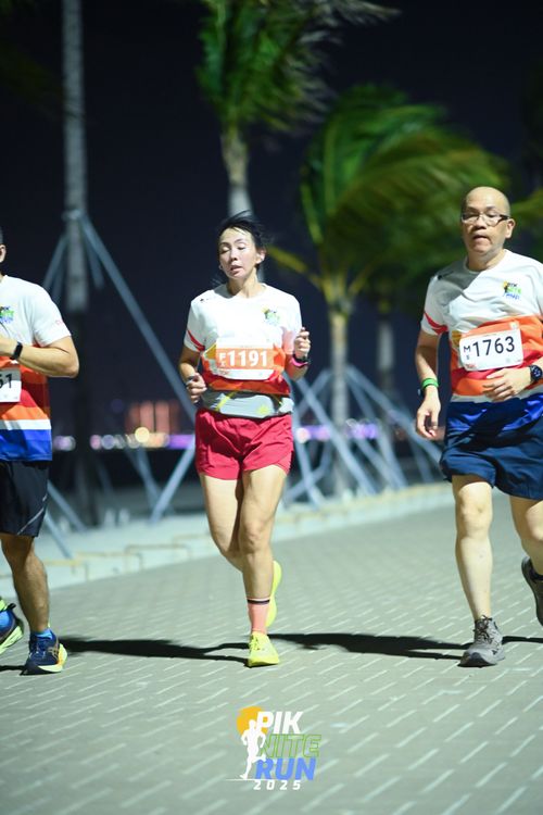 Race photo from PIK NITE RUN 2025