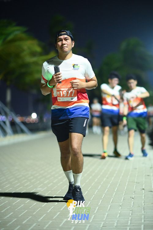 Race photo from PIK NITE RUN 2025