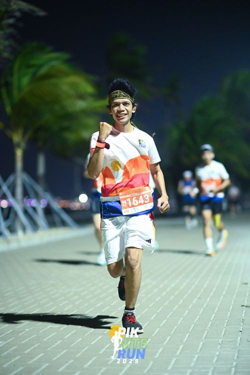 Race photo from PIK NITE RUN 2025