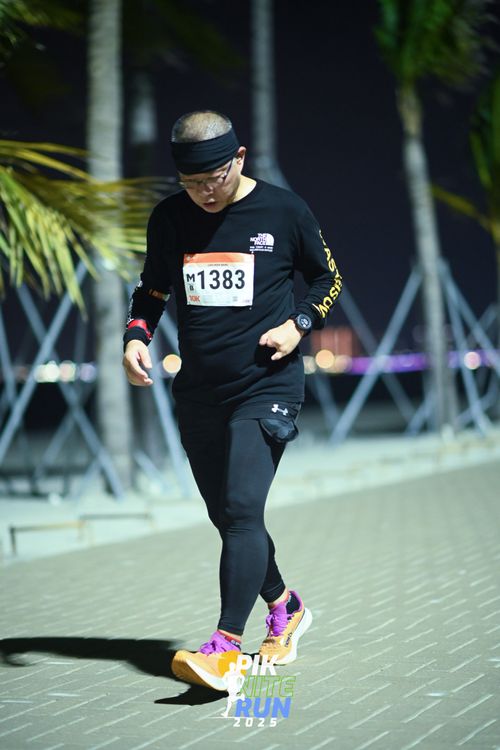 Race photo from PIK NITE RUN 2025