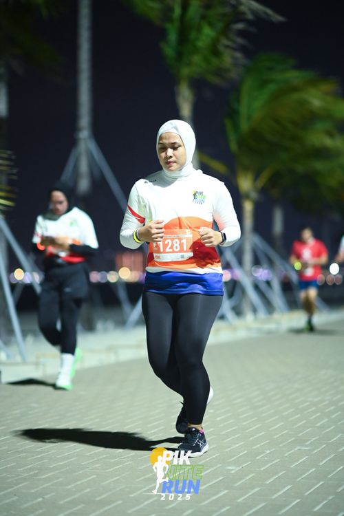 Race photo from PIK NITE RUN 2025
