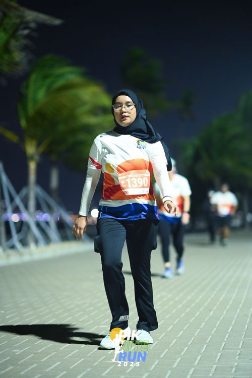 Race photo from PIK NITE RUN 2025