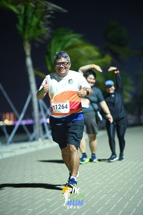 Race photo from PIK NITE RUN 2025