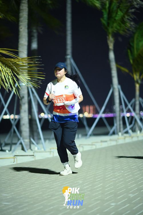 Race photo from PIK NITE RUN 2025