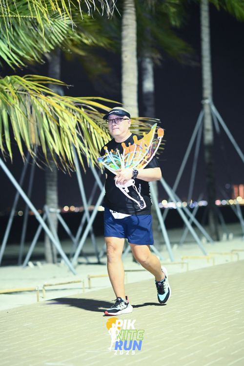 Race photo from PIK NITE RUN 2025