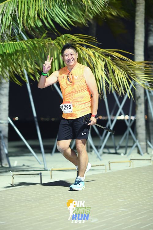 Race photo from PIK NITE RUN 2025