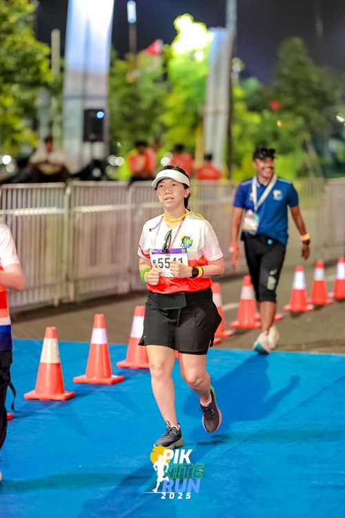 Race photo from PIK NITE RUN 2025