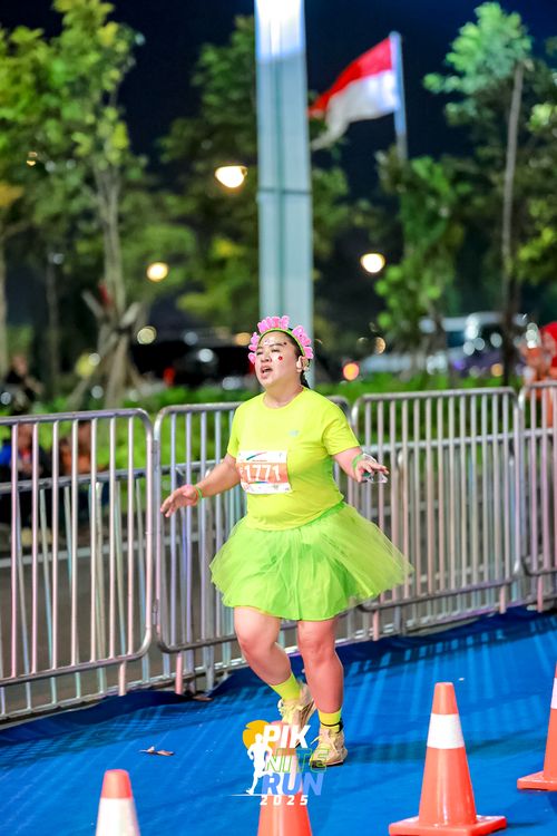 Race photo from PIK NITE RUN 2025