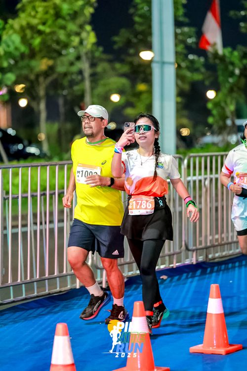 Race photo from PIK NITE RUN 2025