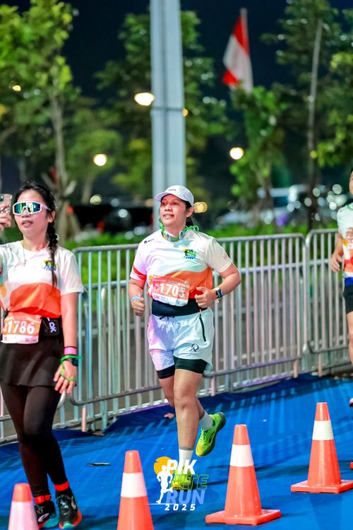 Race photo from PIK NITE RUN 2025