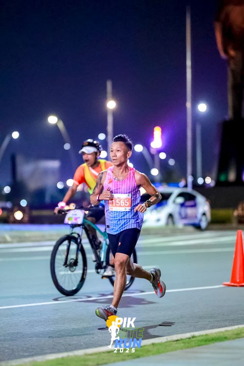 Race photo from PIK NITE RUN 2025