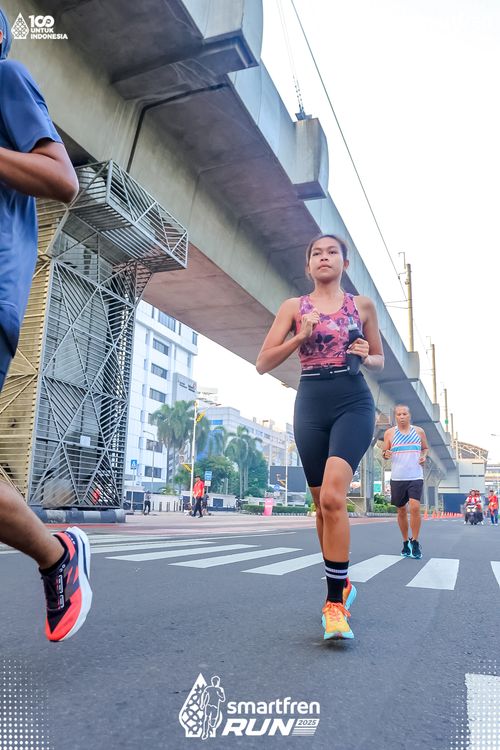 Race photo from Smartfren Run 2025 