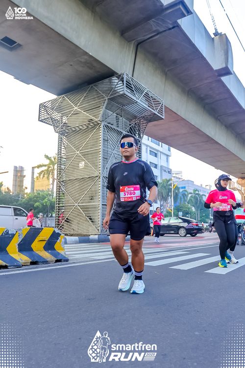 Race photo from Smartfren Run 2025 