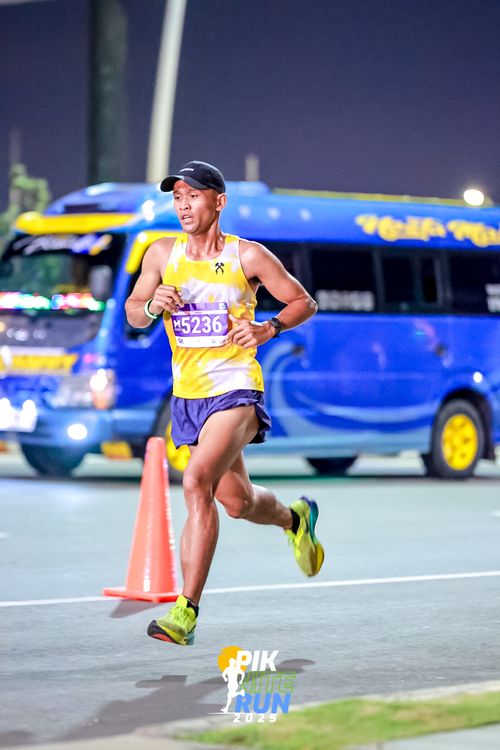 Race photo from PIK NITE RUN 2025