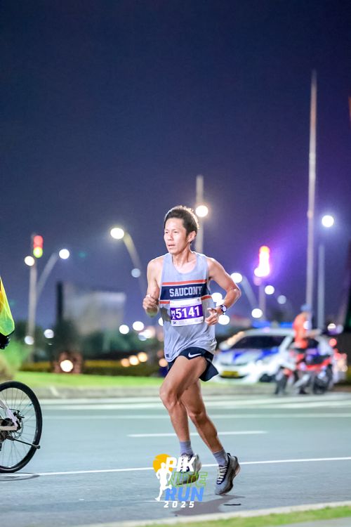 Race photo from PIK NITE RUN 2025