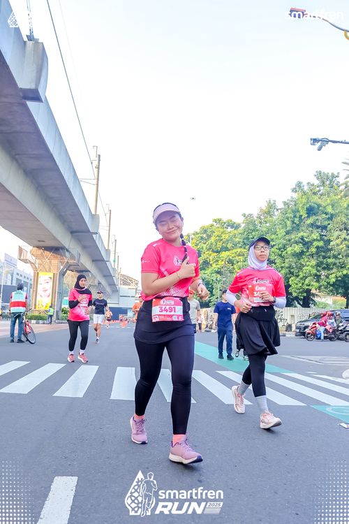 Race photo from Smartfren Run 2025 