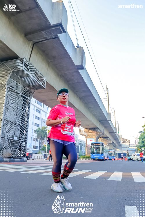 Race photo from Smartfren Run 2025 