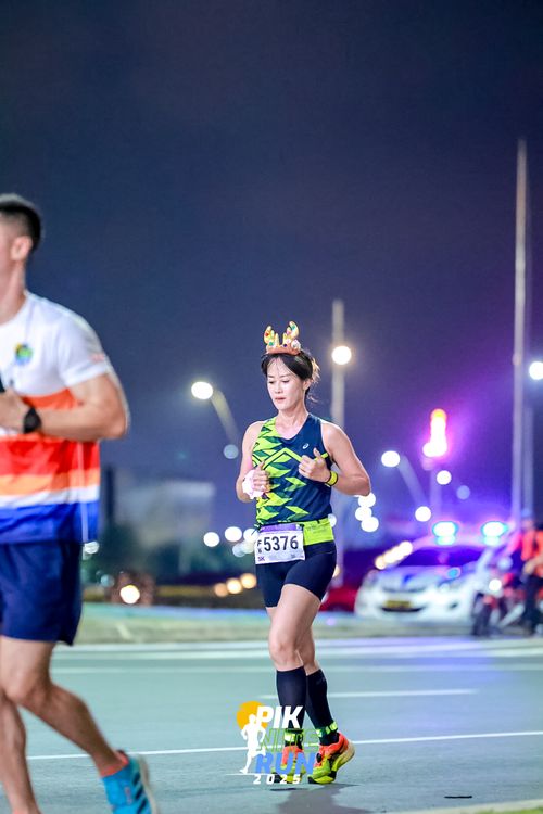 Race photo from PIK NITE RUN 2025
