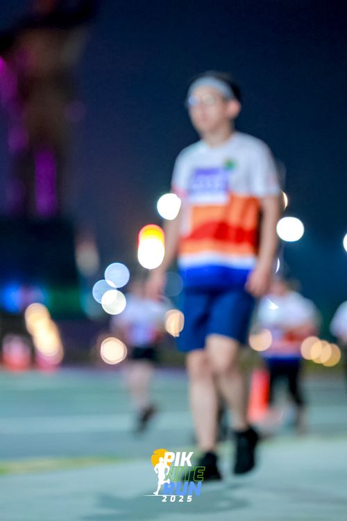 Race photo from PIK NITE RUN 2025