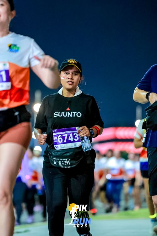 Race photo from PIK NITE RUN 2025