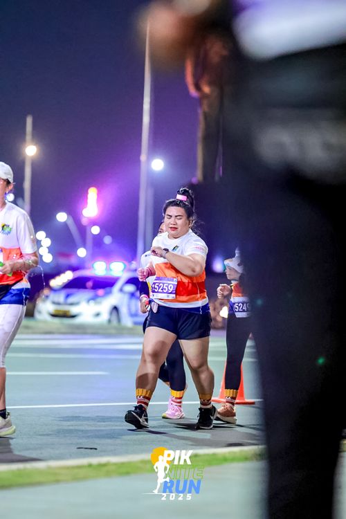 Race photo from PIK NITE RUN 2025