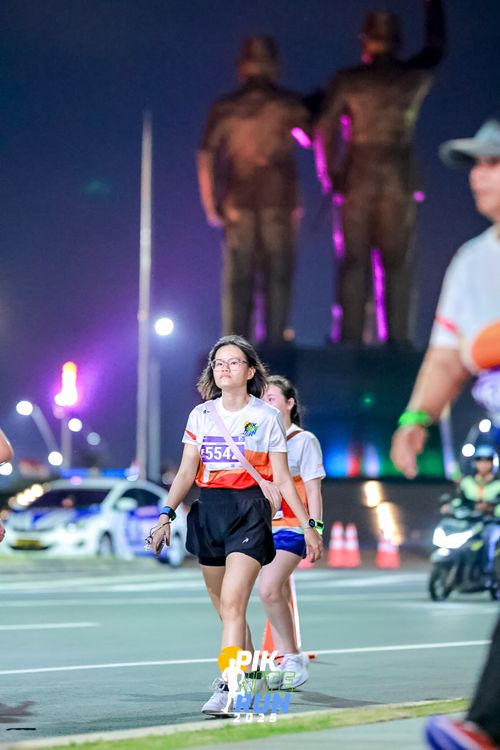 Race photo from PIK NITE RUN 2025