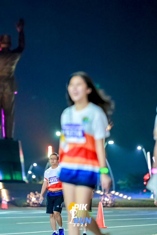 Race photo from PIK NITE RUN 2025