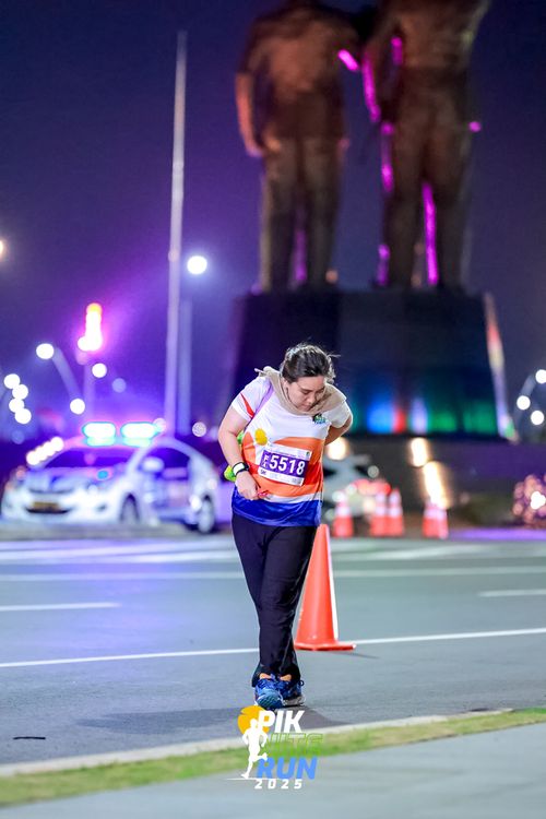 Race photo from PIK NITE RUN 2025