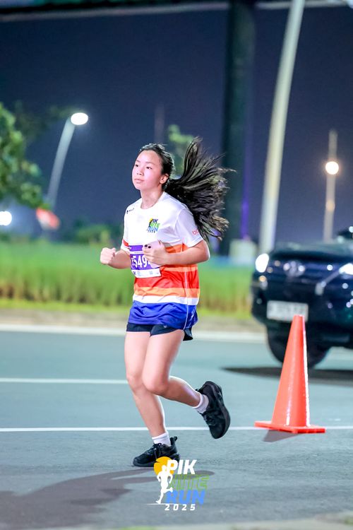 Race photo from PIK NITE RUN 2025