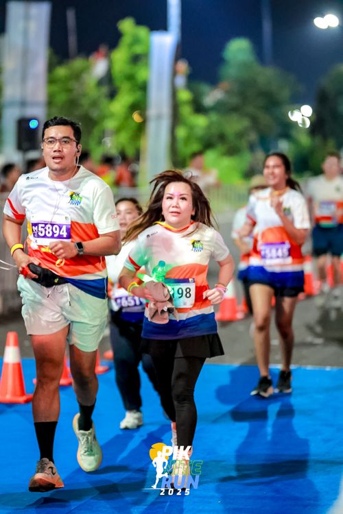 Race photo from PIK NITE RUN 2025