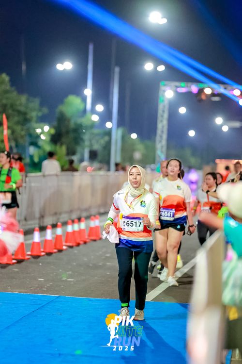 Race photo from PIK NITE RUN 2025