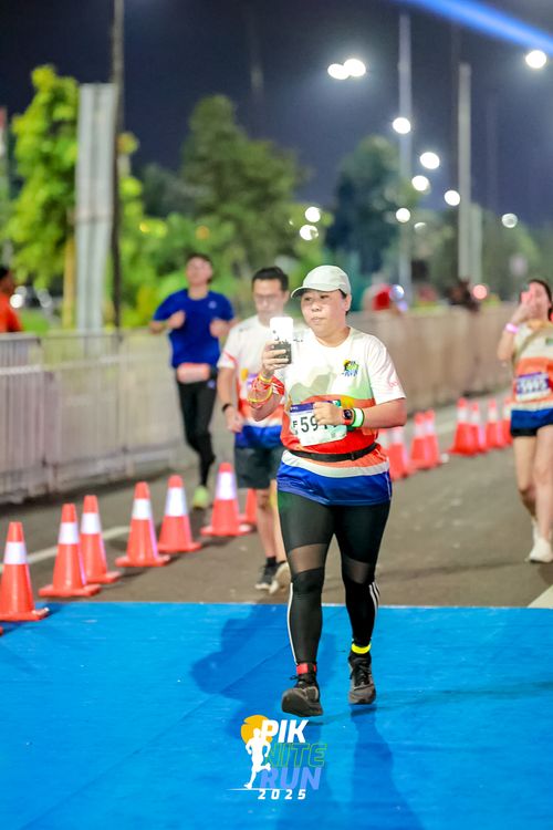 Race photo from PIK NITE RUN 2025