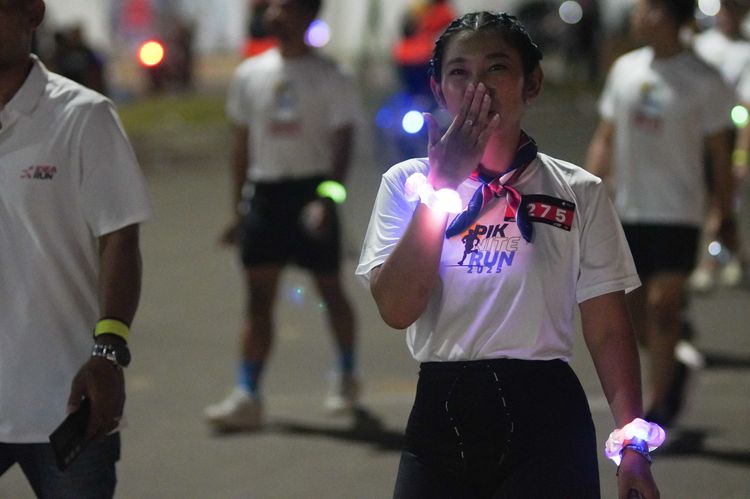 Race photo from PIK NITE RUN VIBES