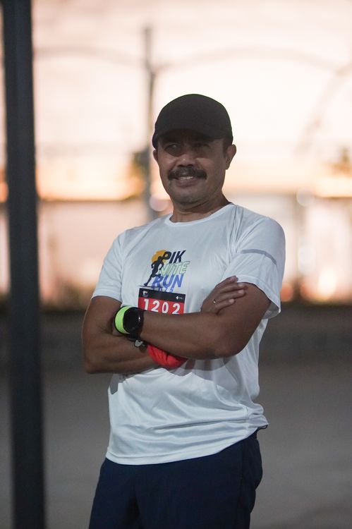 Race photo from PIK NITE RUN VIBES
