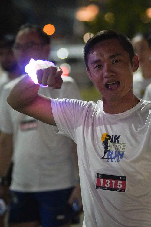 Race photo from PIK NITE RUN VIBES